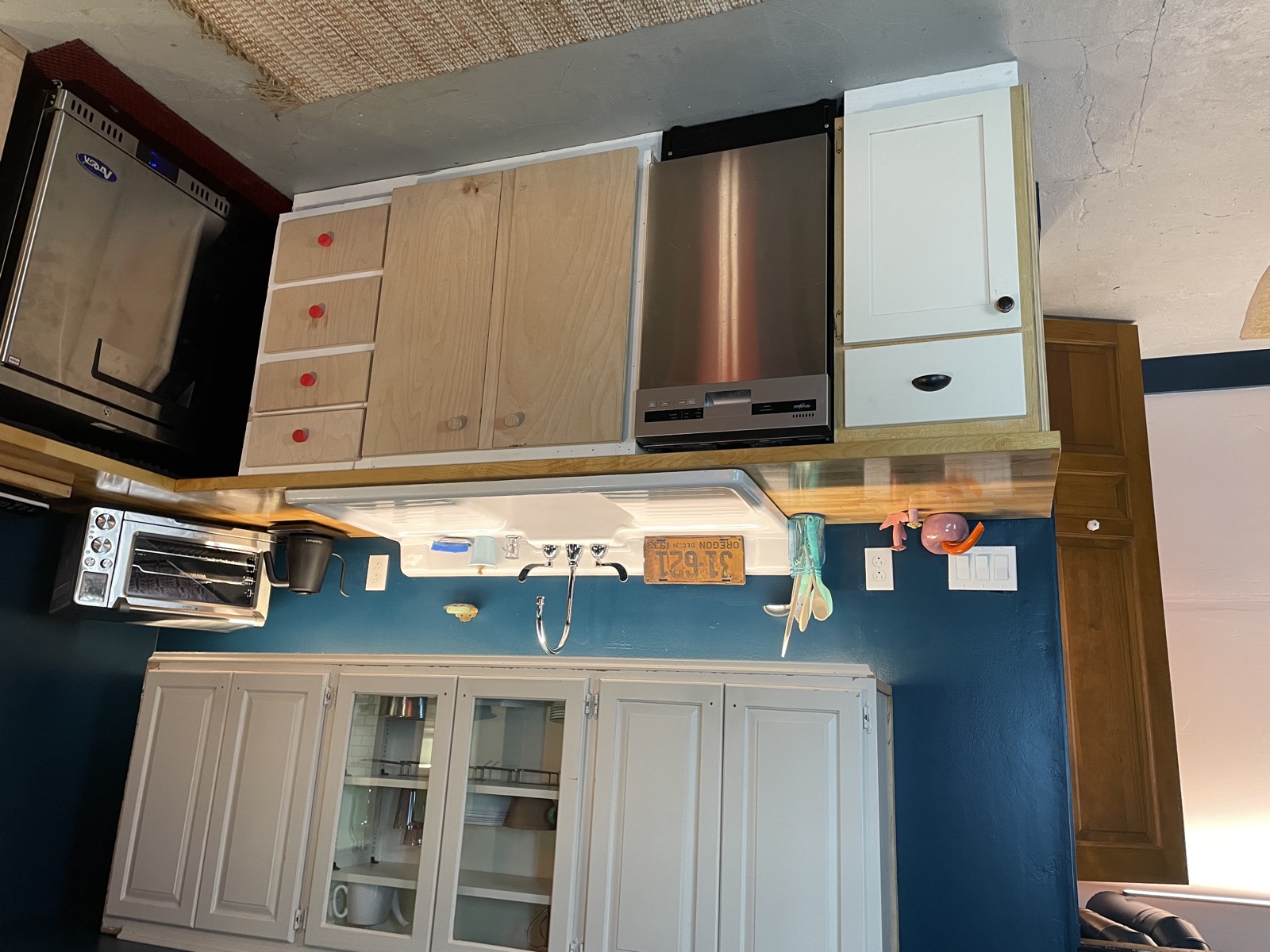 Kitchen cabinets and appliances from a second angle