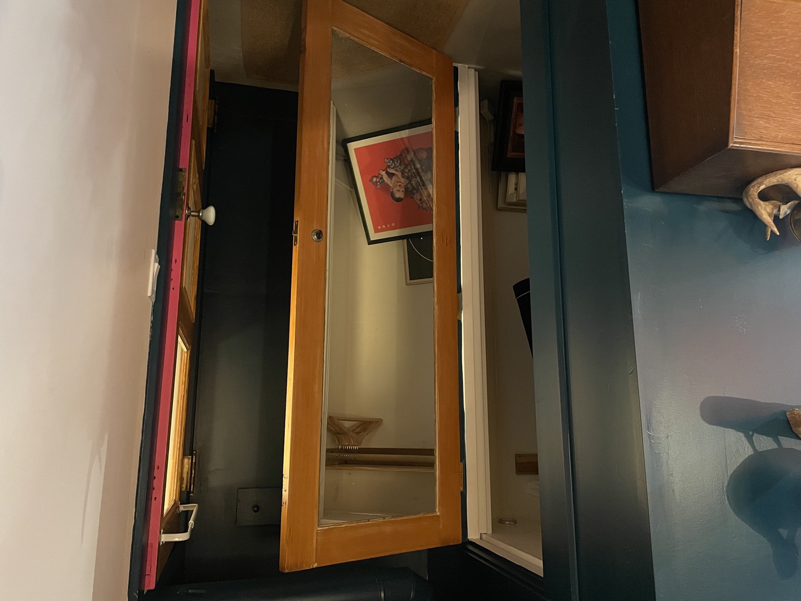 Full-length mirror in the bedroom area