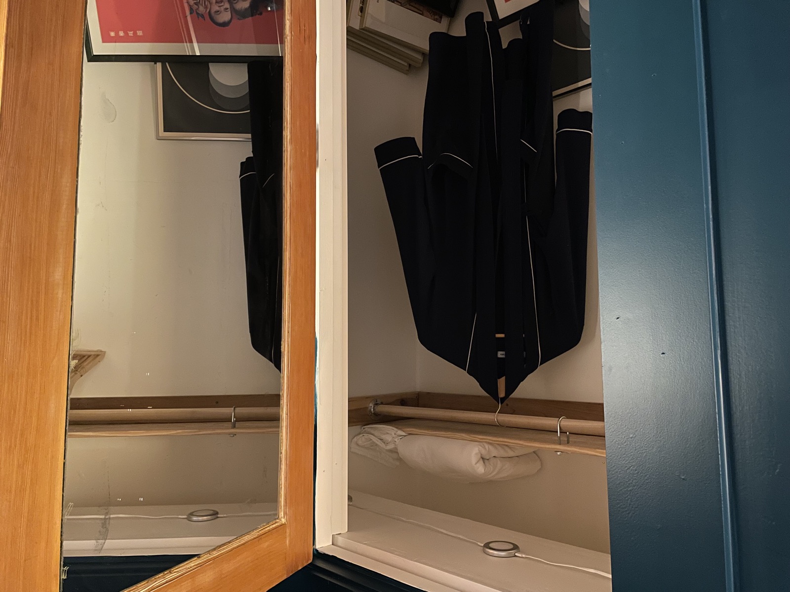 Guest robes hanging in the closet